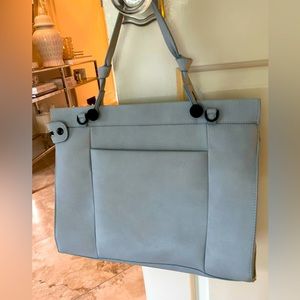Foley and Corinna powder blue handbag.